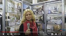 Архитектор Мария Закалата представляет свой стенд на «Российском архитектурном салоне»